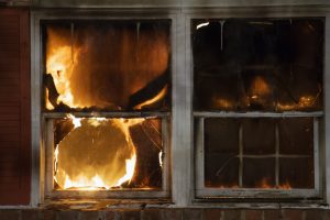 Smoke and Fire Damage to Windows of a Home